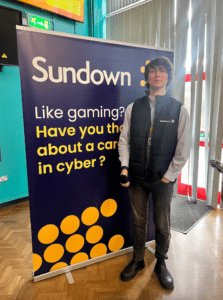 Will Fort of Sundown Solutions Murray Dawson Chair of Amazing Accrington and Tony Grimshaw of What More speaking to pupils from Mount Carmel RC High School