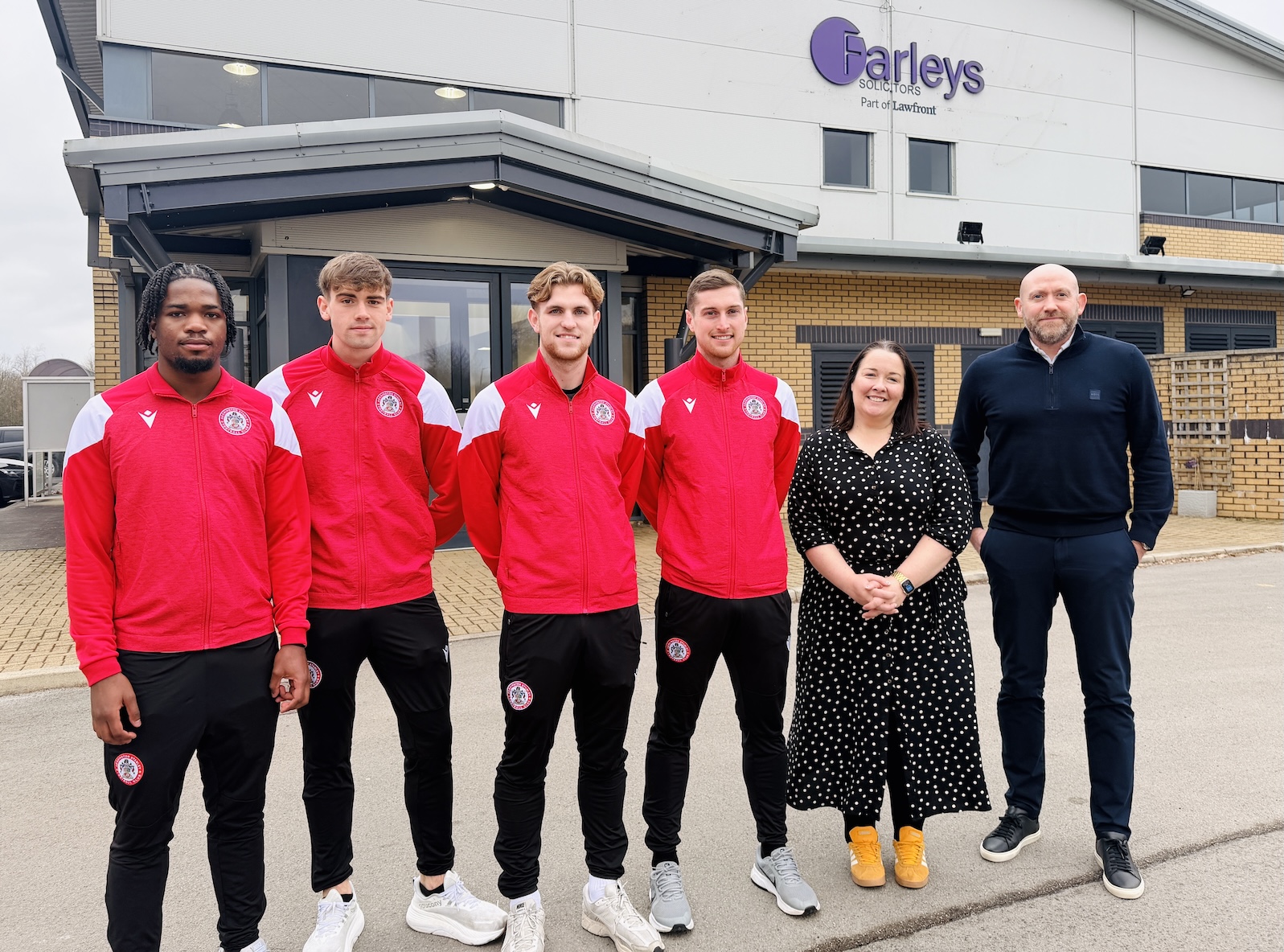 Players Anjola Popoola, Josh Smith, Alex Henderson and Conor Grant, with Reta Rose and Tom O Neill from Farleys Solicitors