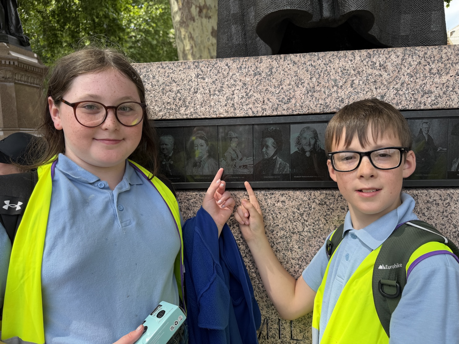 YOUNG PEOPLE FROM ALTHAM ST JAMES PAID RESPECT TO THE PORTRAIT OF LYDIA BECKER IN LONDONS PARLIAMENT SQUARE