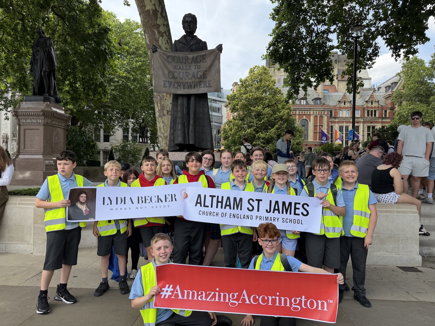 YOUNG PEOPLE FROM ALTHAM ST JAMES PRIMARY VISITED THE STATUE OF MILLICENT FAWCETT AS PART OF THEIR LYDIA BECKER PROJECT